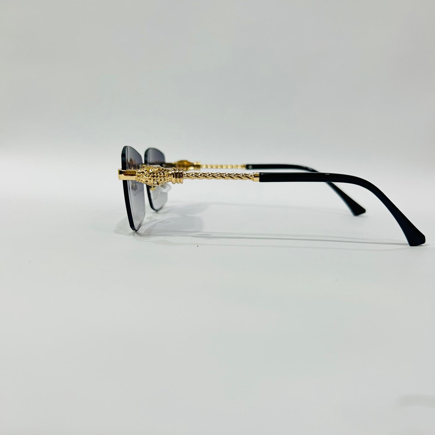 Luxury Rimless Square Sunglasses with Gold Temple & Lion Detail – Unisex