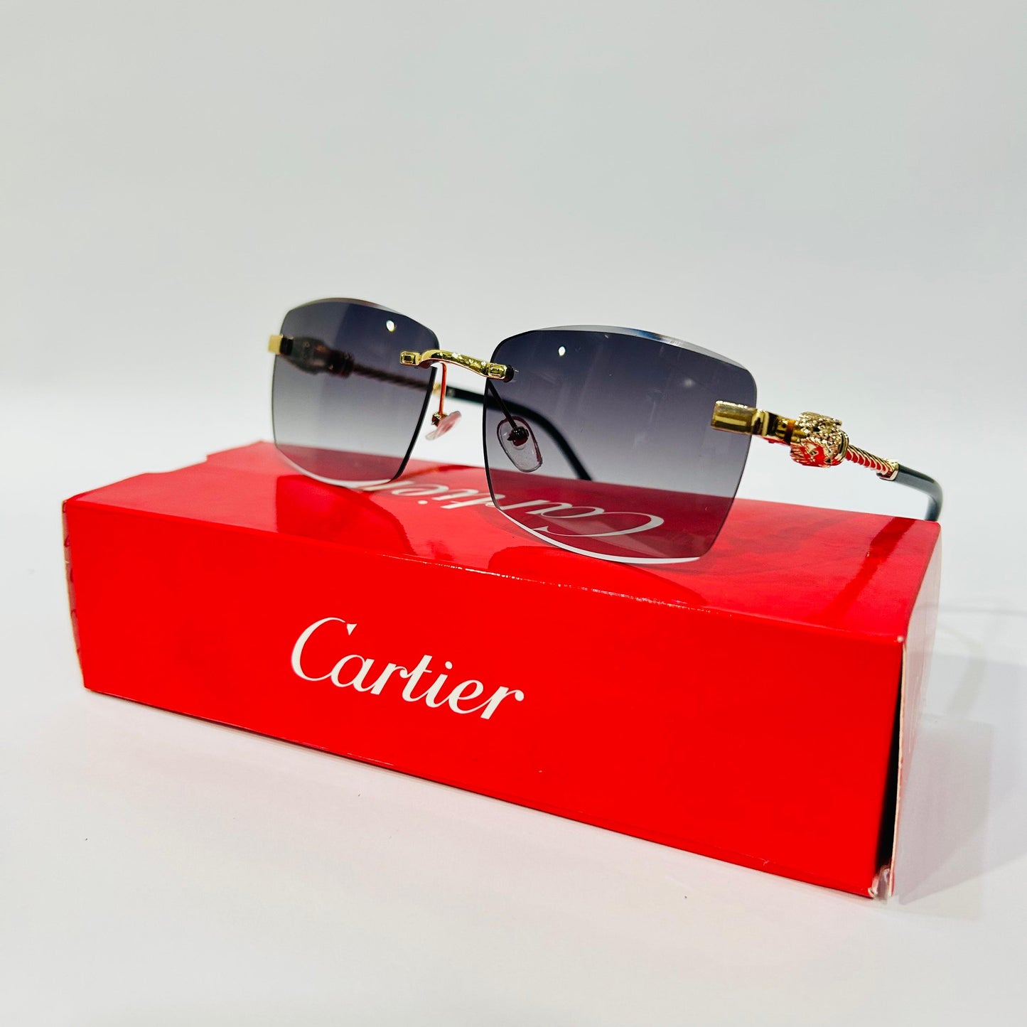 Luxury Rimless Square Sunglasses with Gold Temple & Lion Detail – Unisex