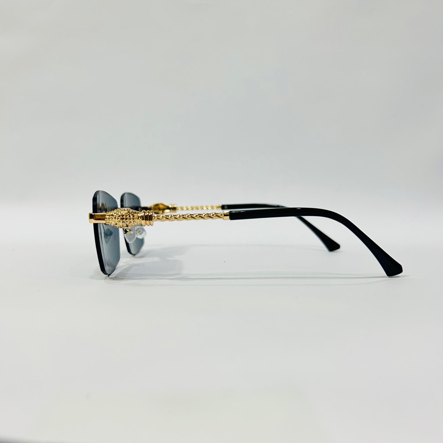 Luxury Rimless Square Sunglasses with Gold Temple & Lion Detail – Unisex