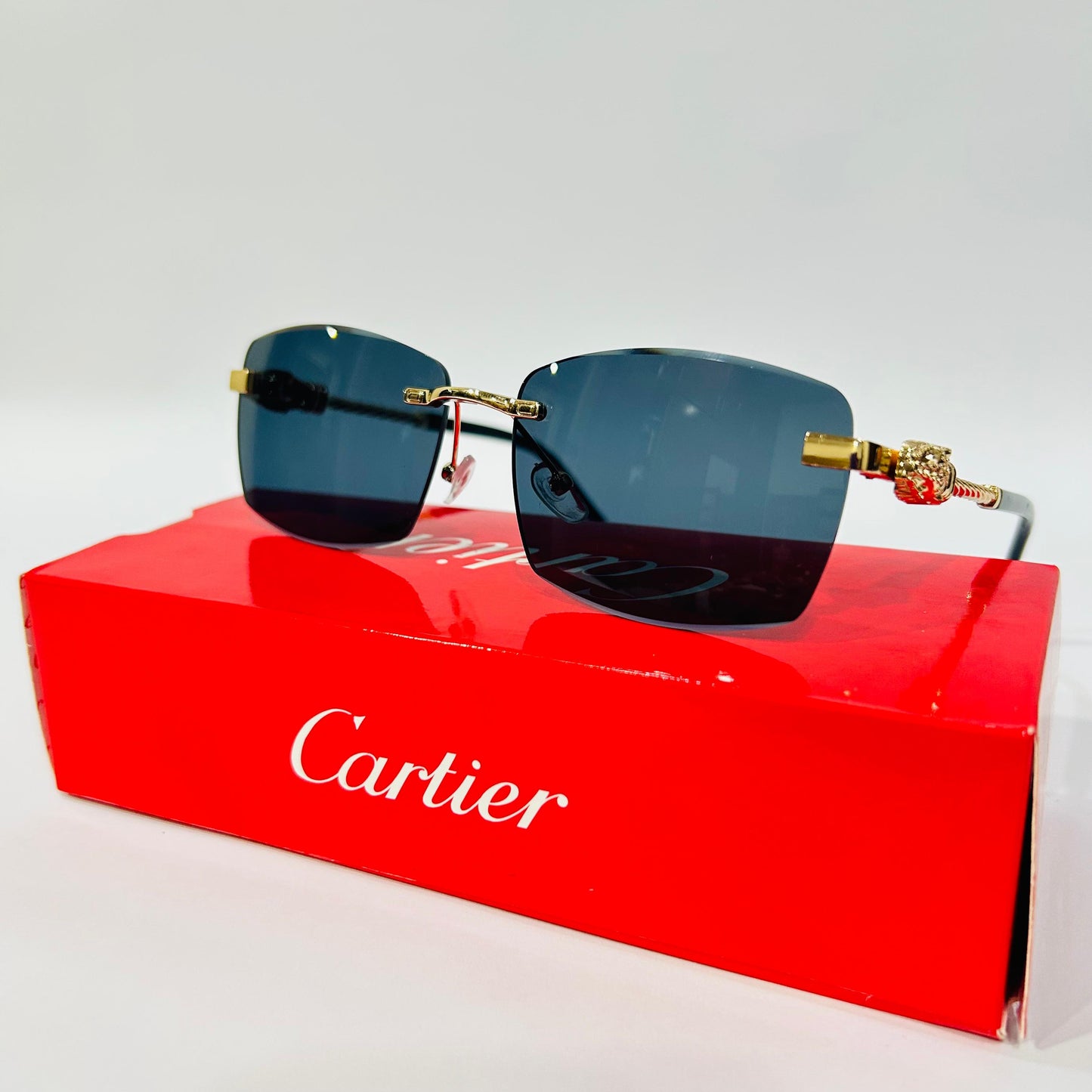 Luxury Rimless Square Sunglasses with Gold Temple & Lion Detail – Unisex