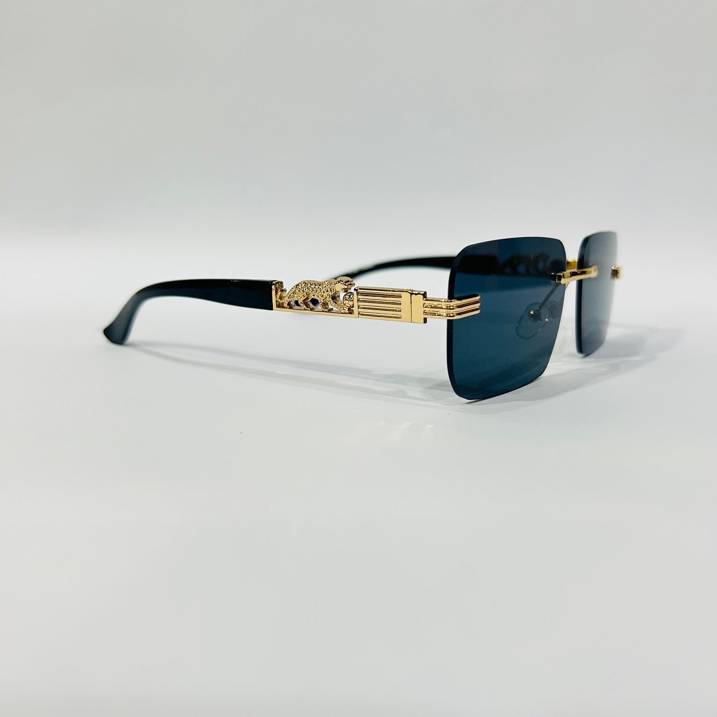 Luxury Rimless Square Sunglasses with Gold Temple & Lion Detail – Unisex