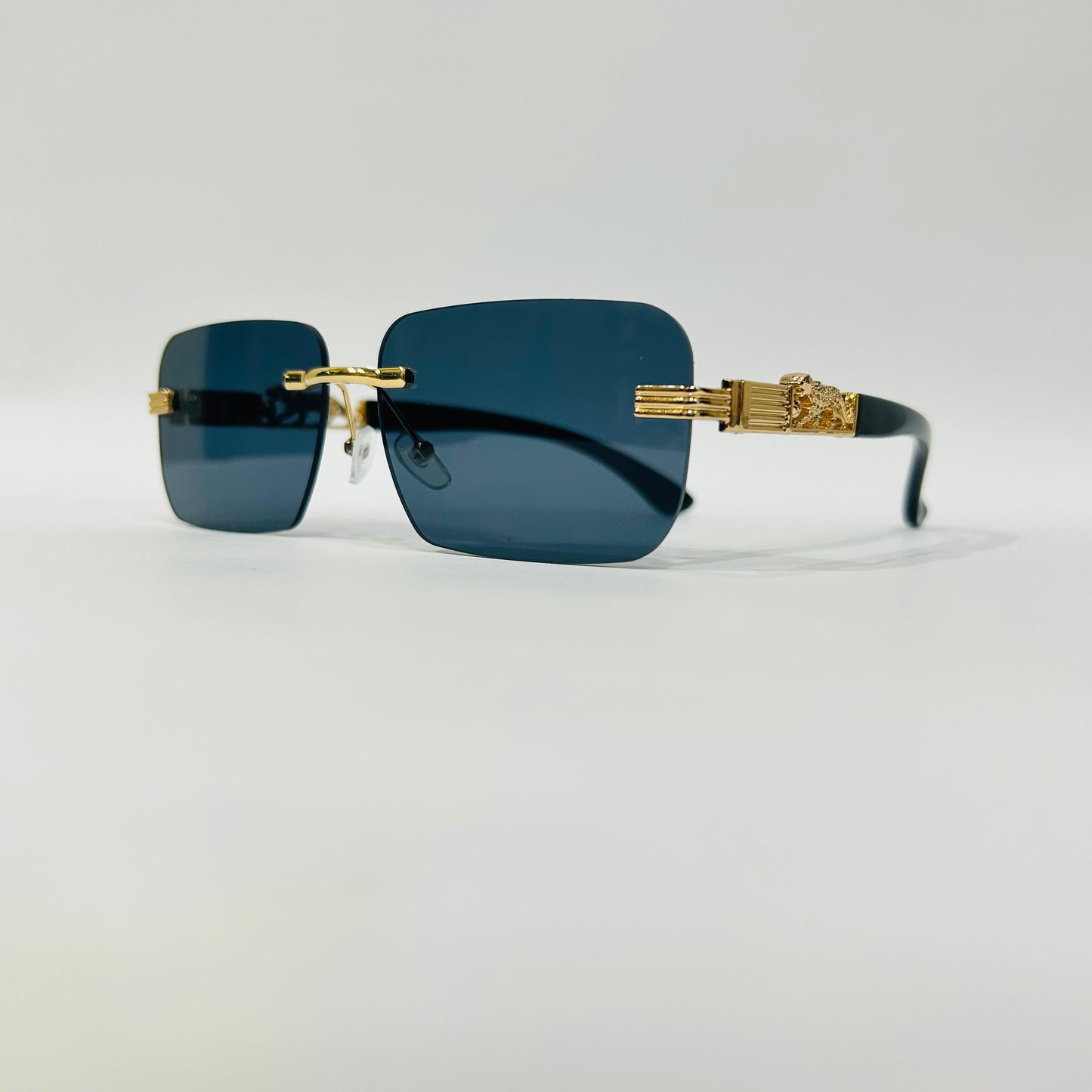 Luxury Rimless Square Sunglasses with Gold Temple & Lion Detail – Unisex