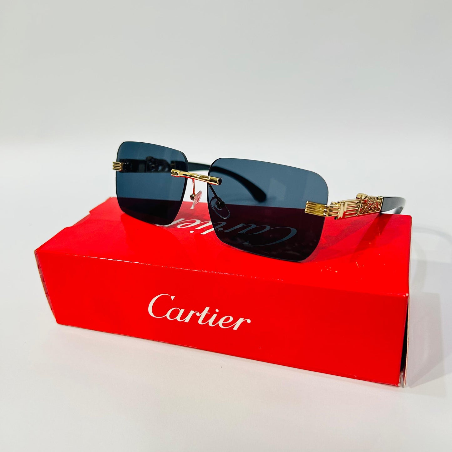 Luxury Rimless Square Sunglasses with Gold Temple & Lion Detail – Unisex