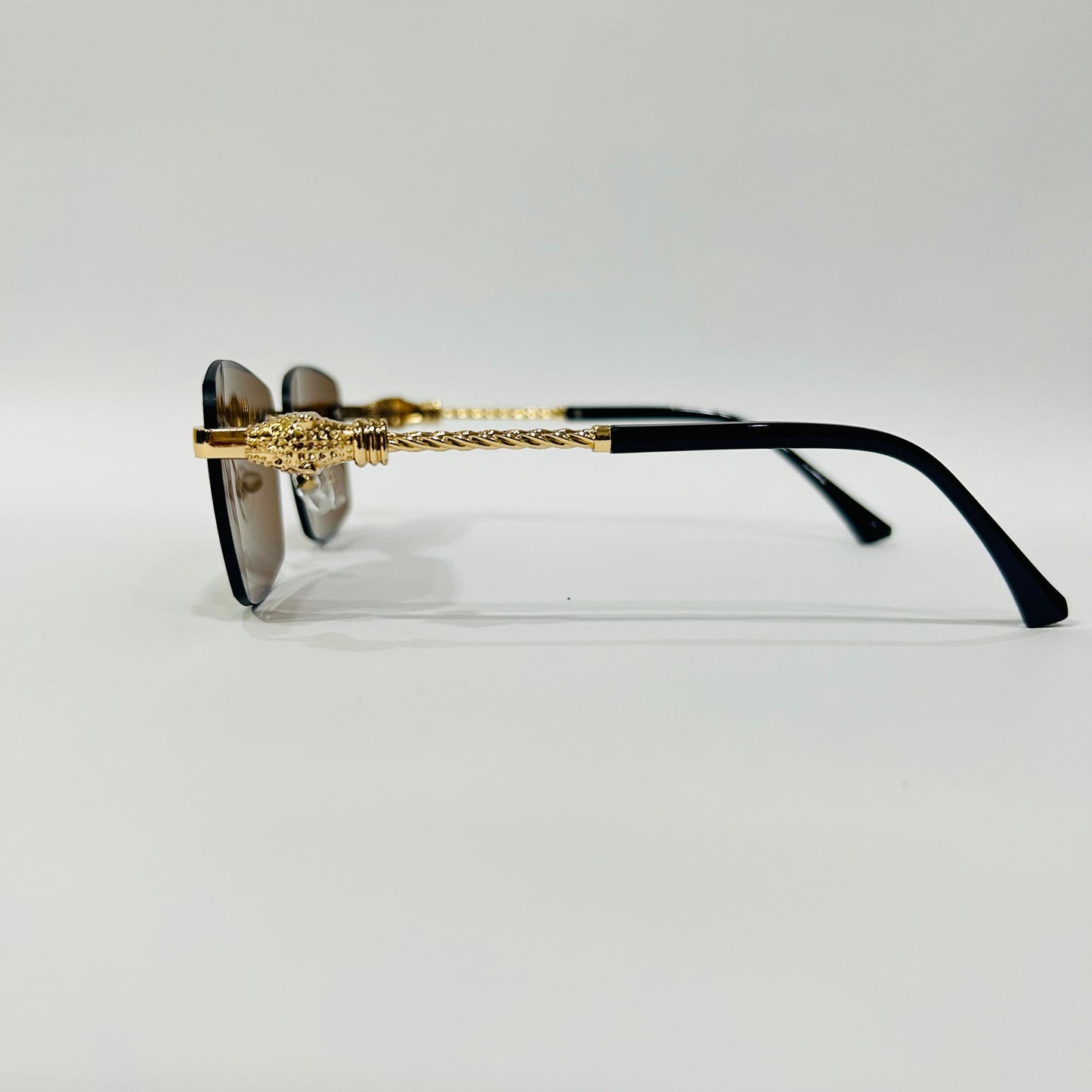 Luxury Rimless Square Sunglasses with Gold Temple & Lion Detail – Unisex